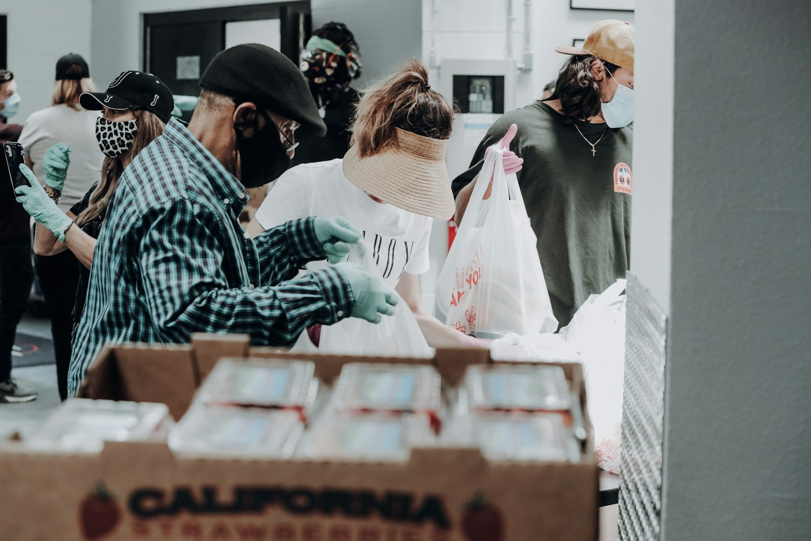 Volunteers loading supply boxes for relief distribution